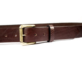 Brown leather belt with a removable gold buckle and a belt loop.